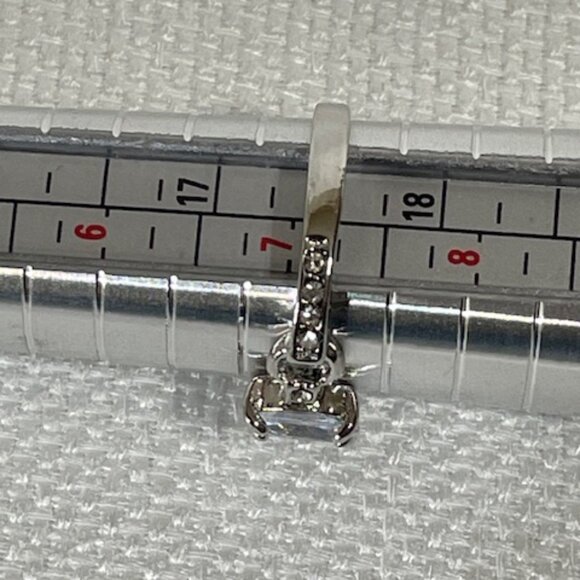 Silver-tone and light blue stone fashion ring.  Appx. size 7 1/4. - Picture 5 of 7